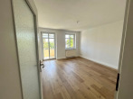 Wohnzimmer mit Balkon