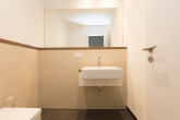 Gäste-WC - Moderner Neubau aus 2020: 3 Zimmer, offene Küche, große Loggia, hochwertige Ausstattung